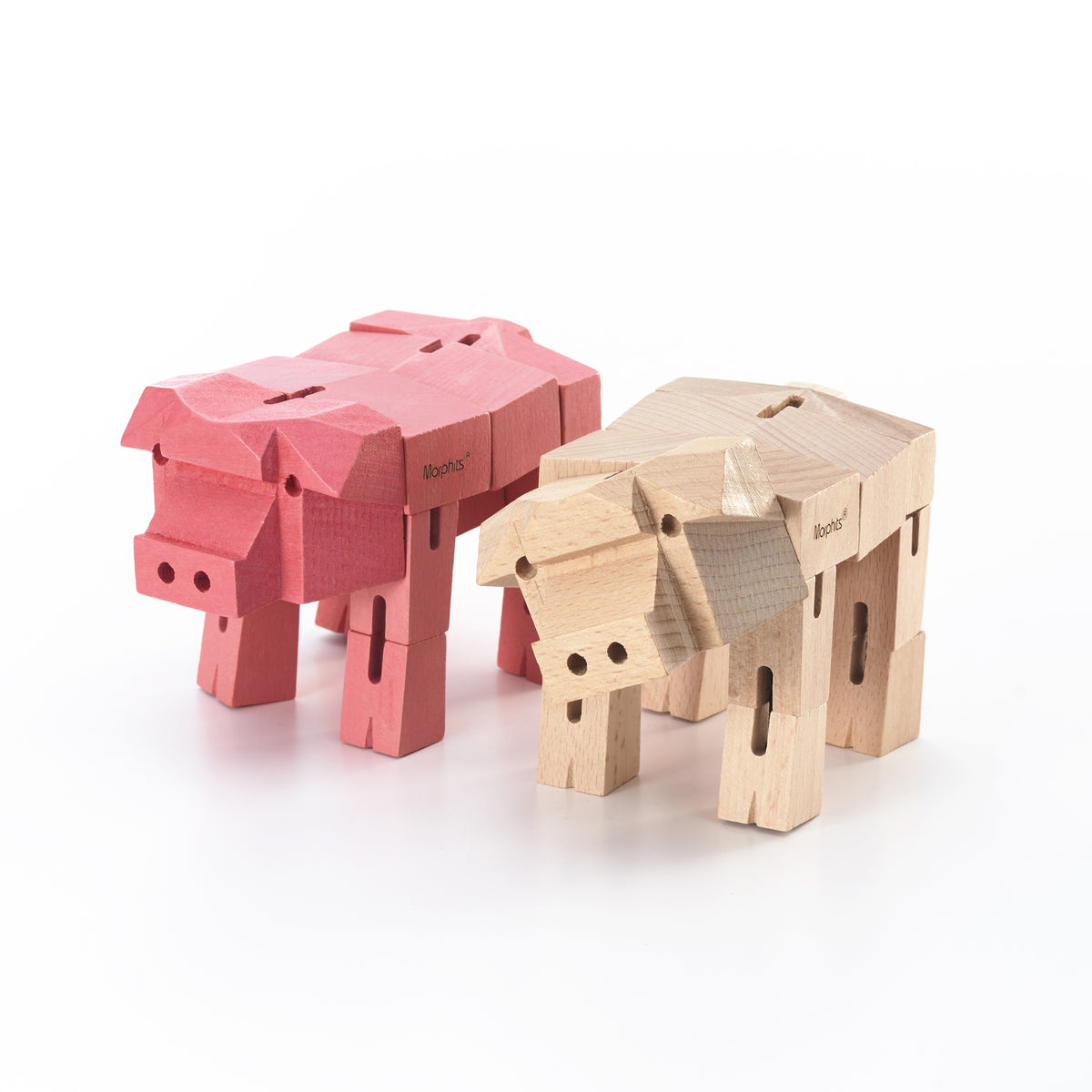 Morphits Pig transformable wooden design object with articulated joints.